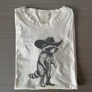 Vintage Cowboy Raccoon Shirt, Funny Western Animal Graphic Tee, Country Style Bootleg Shirt, Cute Farmcore Aesthetic Tee, Trendy Streetwear Gift, Gift for Men, Gift for Women, Crew Neck T-shirt, Trending T-shirt