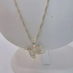 colibri pendant with chain laminated gold