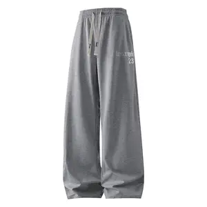 Athleisure Flow Mens Performance Wide Leg Sweatpants Moisture Wicking Heather Grey Drawstring Pants with Relaxed Drop Crotch for Gym Warm-Ups and Post-Workout