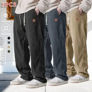 Three-piece loose casual pants, simple and versatile style, elastic waistband suitable for various body types, side pockets for convenient storage, wide straight leg design allows free movement without restriction,  Menswear Trouser