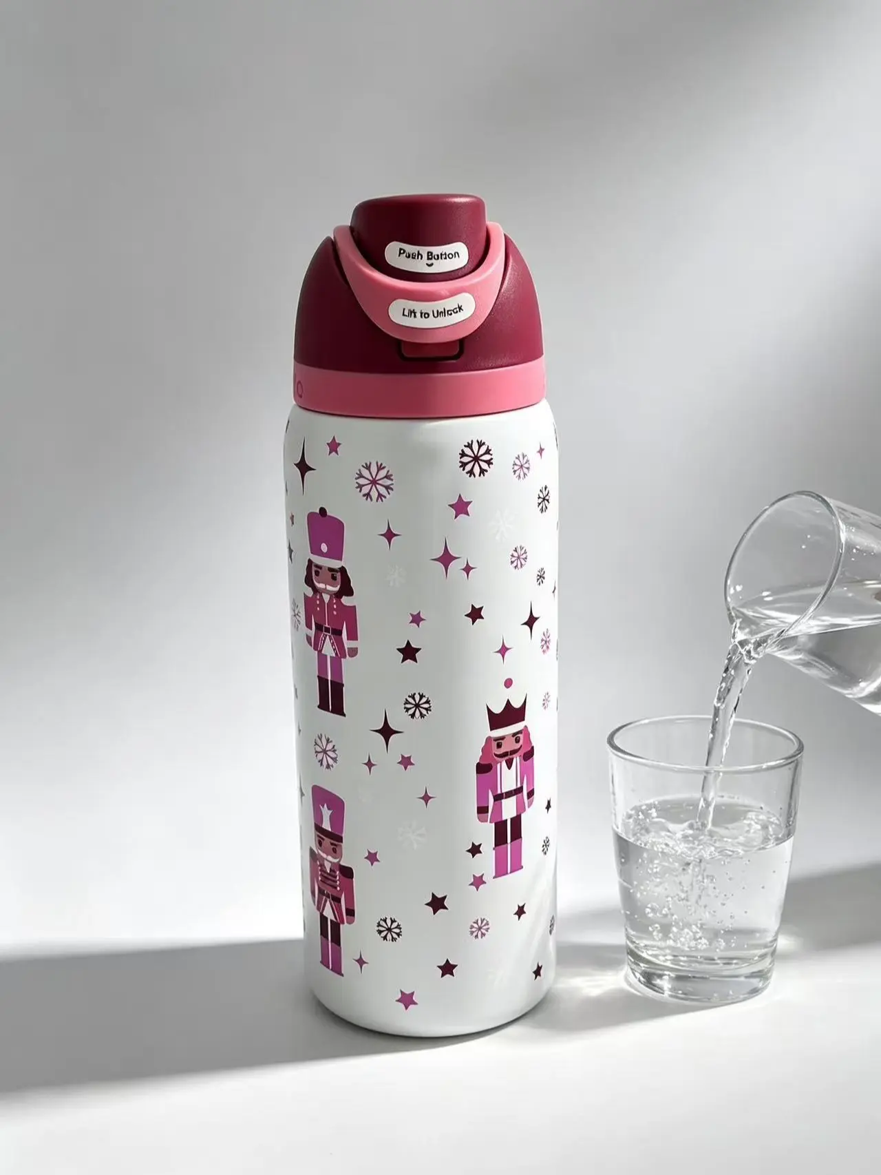 Owala FreeSip Limited Edition Nutcracker Insulated Water Bottle 24oz, Pink Christmas Soldier Snowflake Stainless Steel Tumbler, Leakproof Lockable Flip Lid, BPA-Free Cold Keeping Sports Travel Cup for Holiday Gift School Gym