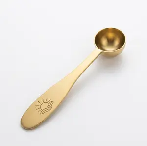 Golden Measuring Spoon