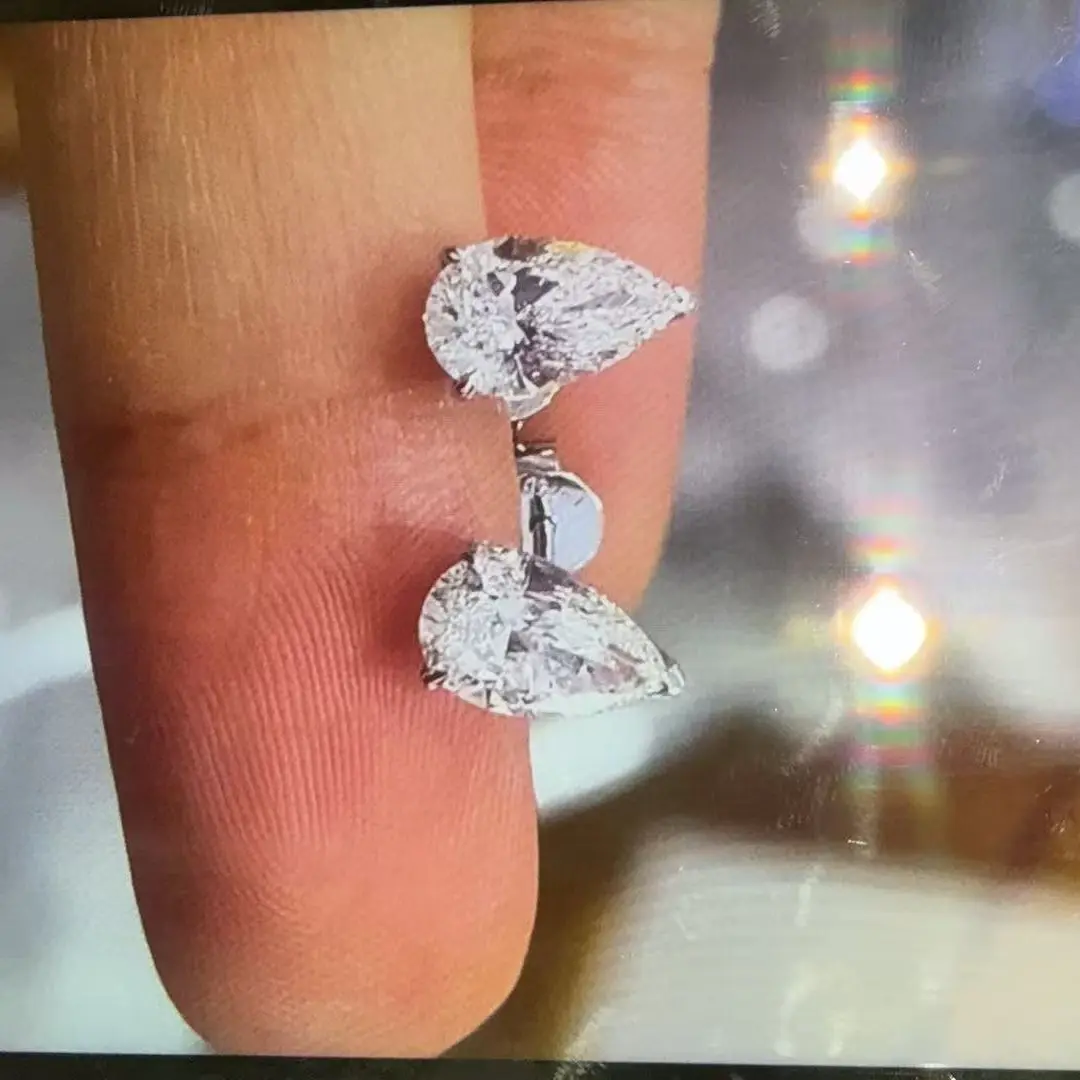 Jacqueline-One pair of pear-shaped diamond - earrings-simple setting-cc