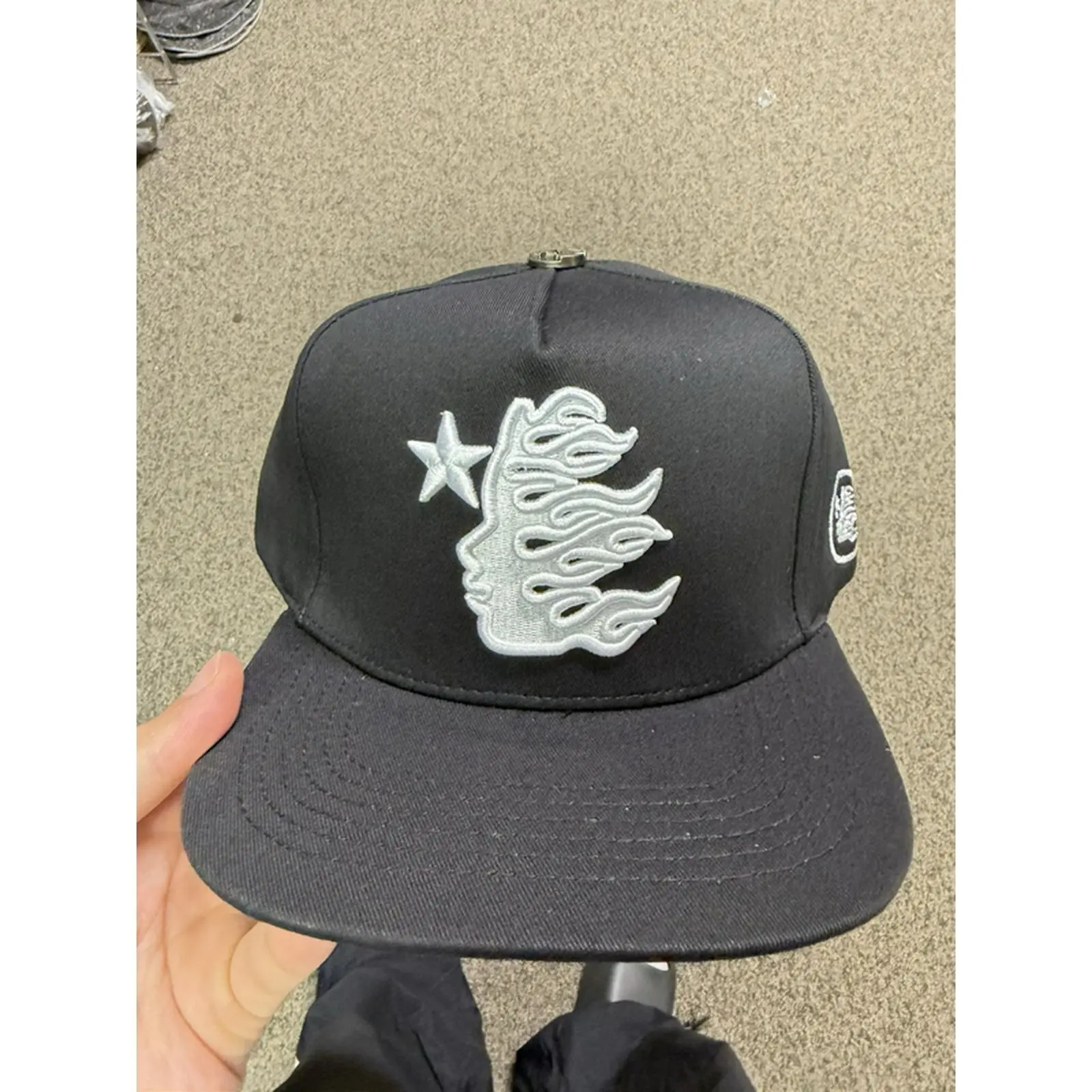Black Snapback Hat with Star and Flame Design, Adjustable Fit, Ideal for Casual Wear