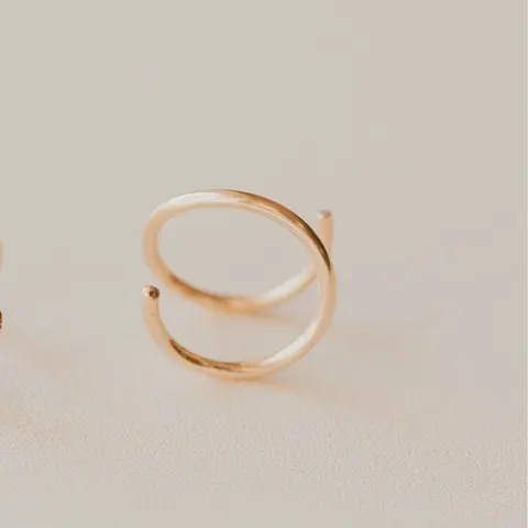 Hello Adorn Tiny Twist Nose Ring - Lightweight Design for Versatile Use