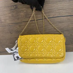 Pre-owned Dior Patent calfskin leather Crossbody Bags Lady chain wallet in yellow patent leather with cannage quilting.qg1805