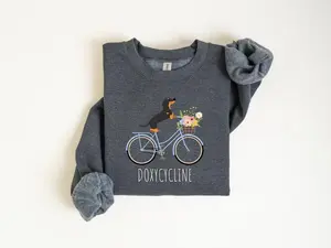 Doxycycline Pharmacy Pun Sweatshirt, Dachshund on Bicycle Hoodie, Pharmacists Shirt, Pharmacists and Technicians Gift, Veterinary, Pharmacist Gifts Cotton Crewneck