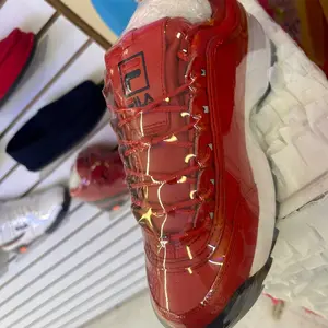 Fila Disruptor II Red Patent Leather Sneakers with Bold Design and Comfortable Fit