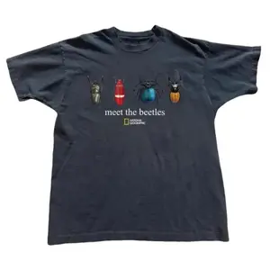 Humorous Mens Graphic TShirt Featuring Stop Wondering Get Your Bread Up Motif with Smiling Bread Slice Illustration