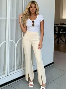A women's fashionable and gentle style apricot split flared pants with a high waist and a slimming effect, suitable for all seasons, afternoon tea, interviews, commuting, and store visits.