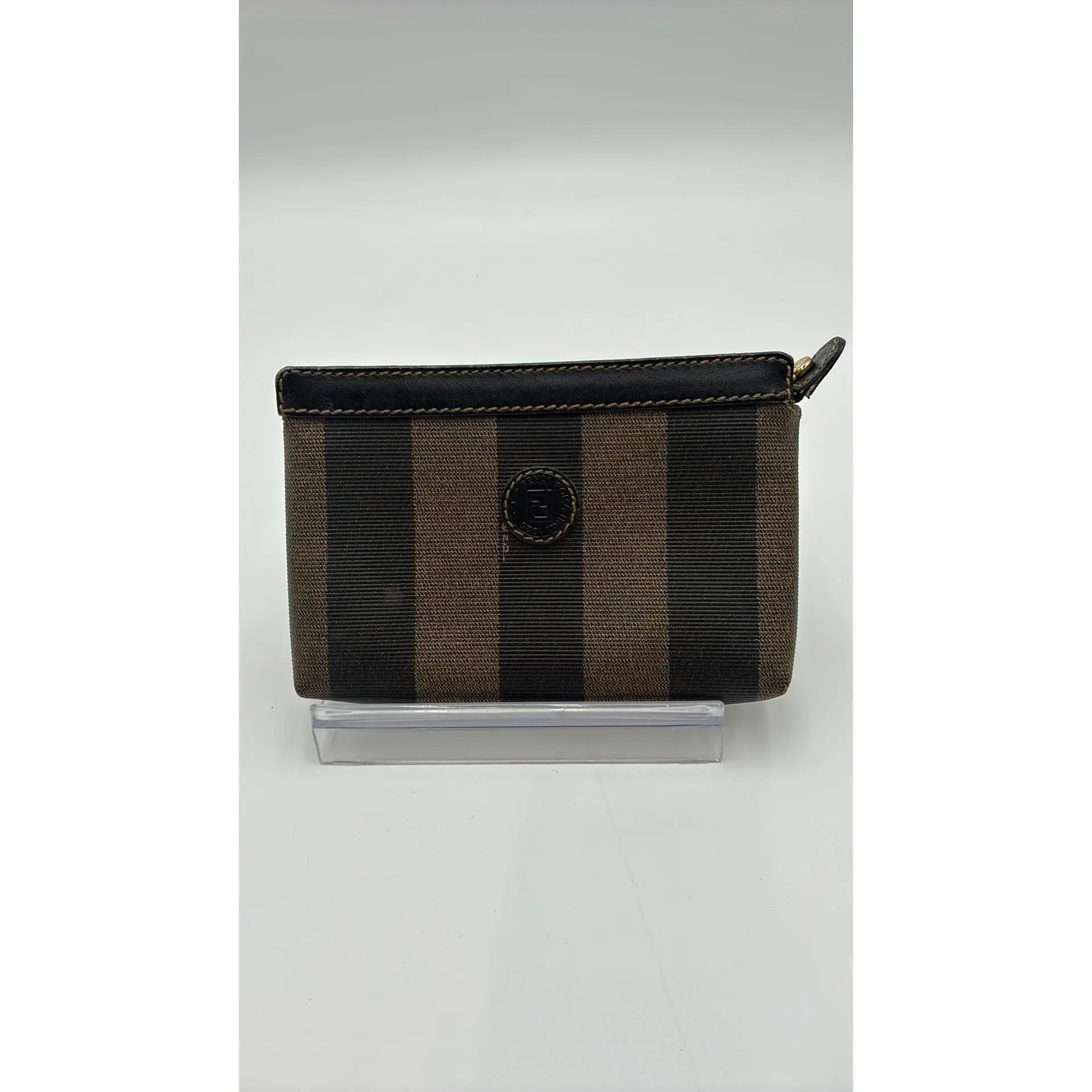 Pre-owned Leather Luxury Bags & Accessories Fendi Pequin Zippy Small Clutch Date Code: 244118081018. Entrupy ID: 8HDGTM4. CHICAGO