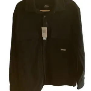 Dr Essentials Black corduroy long sleeve button up men’s size Medium