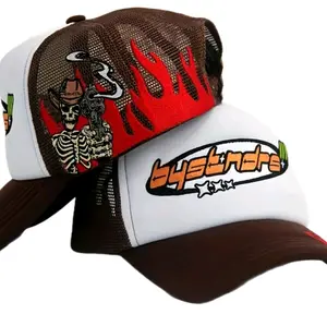 bystndrs inferno skeleton trucker hat Premium Front Embroidery: Bold "Bystndrs" logo adds a sleek and stylish touch.  Side Embroidery: Highly detailed artwork of a skeleton cowboy unisex hat trucker hat