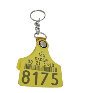 Cow Tags 3 Inch Tall Yellow Keychain with Number 8175 and Text MX SADER 00 21 1510 6/23. Nunmbers vary