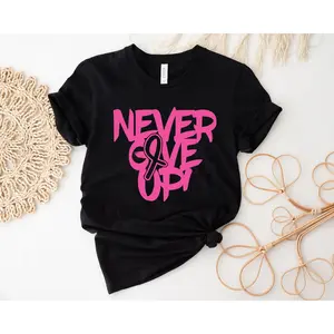 Women's breast cancer awareness and motivation Graphic T-Shirt - Short Sleeve Crew Neck Regular Fit Casual Wear | Soft & Breathable Fabric, Durable Print, Everyday Comfort, Machine Washable, minimalist and flat-lay product photography with decorative