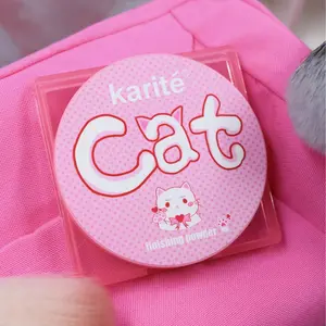 Translucent compact powder by Cat Karité, offering a matte and smooth finish, suitable for all skin types.