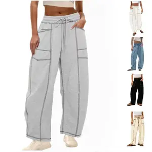 Women's high-waisted, loose-fitting wide-leg sweatpants with drawstring, pockets, and stitching details | Regular fit suitable for spring and autumn.