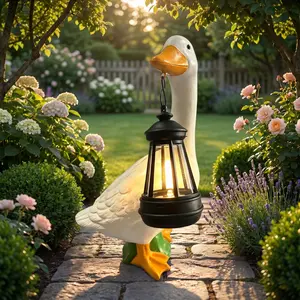 Cute little duck solar garden lamp, outdoor waterproof solar lamp, statue with lantern, for courtyard decoration and art display, the best gift for grandmother/mother