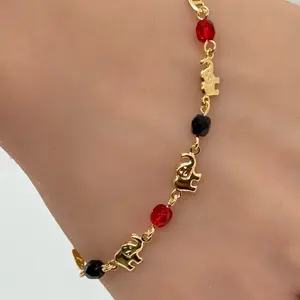 14k Gold Plated Elephant Bracelet with Black and Red Beads, Featuring Elephant Charm and Gold-Tied Design