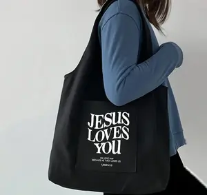 Tote Only - Black Tote Bag with "Jesus Loves You" Text and Biblical Verse 1 John 4:16 Design