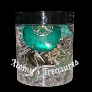 Xiomys Clear Plastic Jewelry Organizer Jar with Lid for Storage and Display Featuring Necklaces Bracelets Bangles Earrings Rings in Mixed Metal Tones