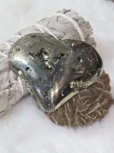Pyrite Heart carving with druzy pockets that sow off the cube matrix of the pyrite.