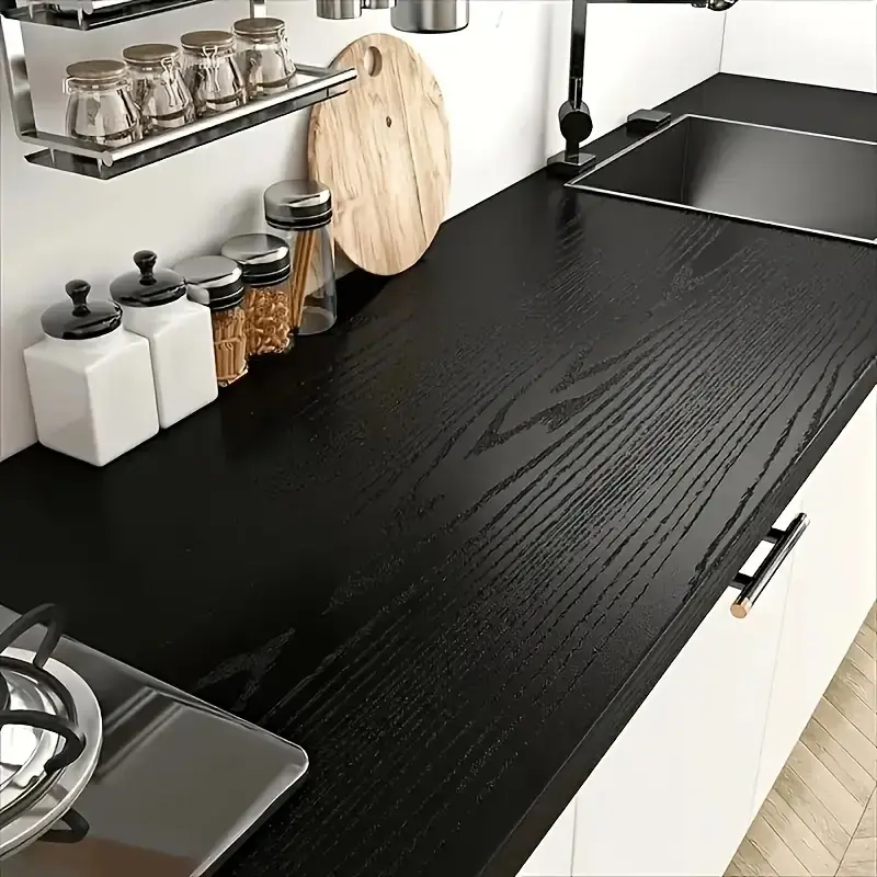 A roll of black wood grain stickers, waterproof and oil-proof vinyl film, Textured Wallpaper, Kitchen Wallpaper Peel And Stick, easy to paste and remove, modern hollow pattern, semi-gloss, self-adhesive, reusable PVC material