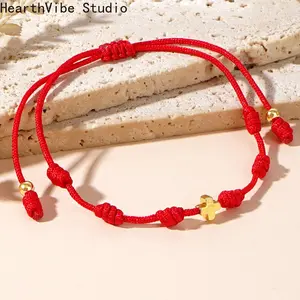 A Bohemian Minimalist Style Women'S Fashion Bracelet Featuring 4Mm Vacuum- Copper Beads, a Cross, And a Peruvian Knot with an Adjustable Red String, Perfect As a Lucky Gift for Everyday Occasions.