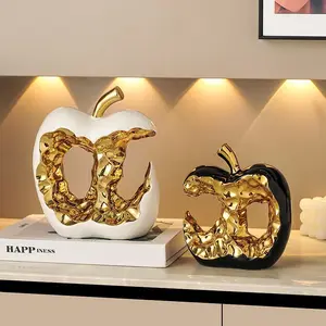 Luxury Gold & White Apple Decorative Sculpture - Modern Hollow-Out Resin Statue for Home, Office, and Table Centerpiece