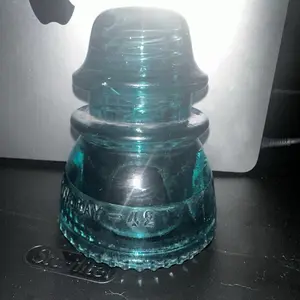Vintage Hemingway 42 turquoise/aqua blue telephone pole glass insulator. Utensils