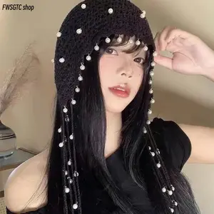 Boho style knitted hat features ethnic crochet pattern and hollow out design, adorned with delicate pearls. Stylish chain details add unique charm. Suitable for women and girls, great fashion accessory for daily casual outfits.