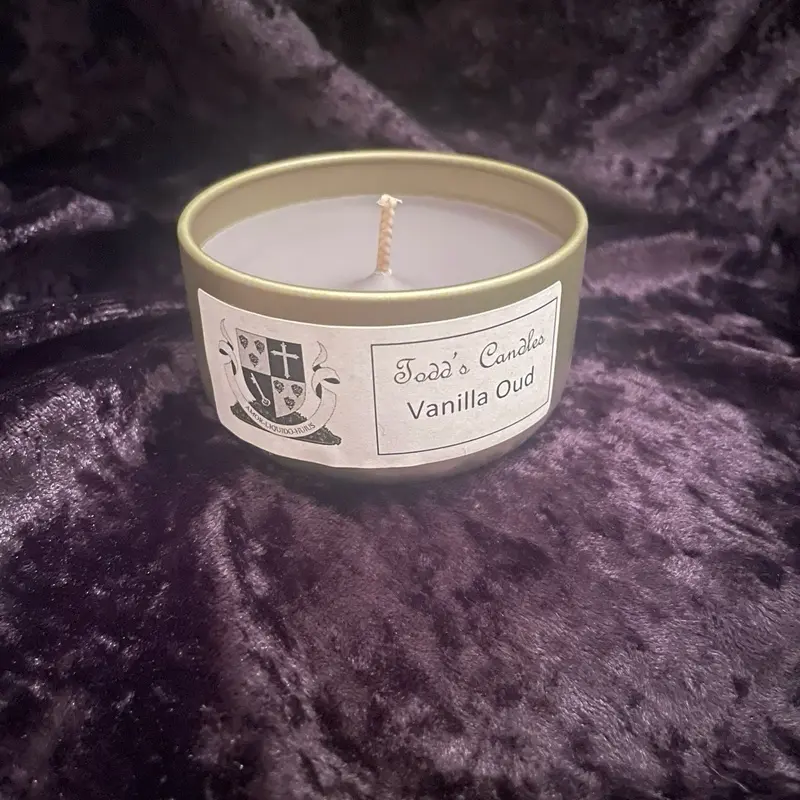 3 oz gold Vanilla Oud scent candle