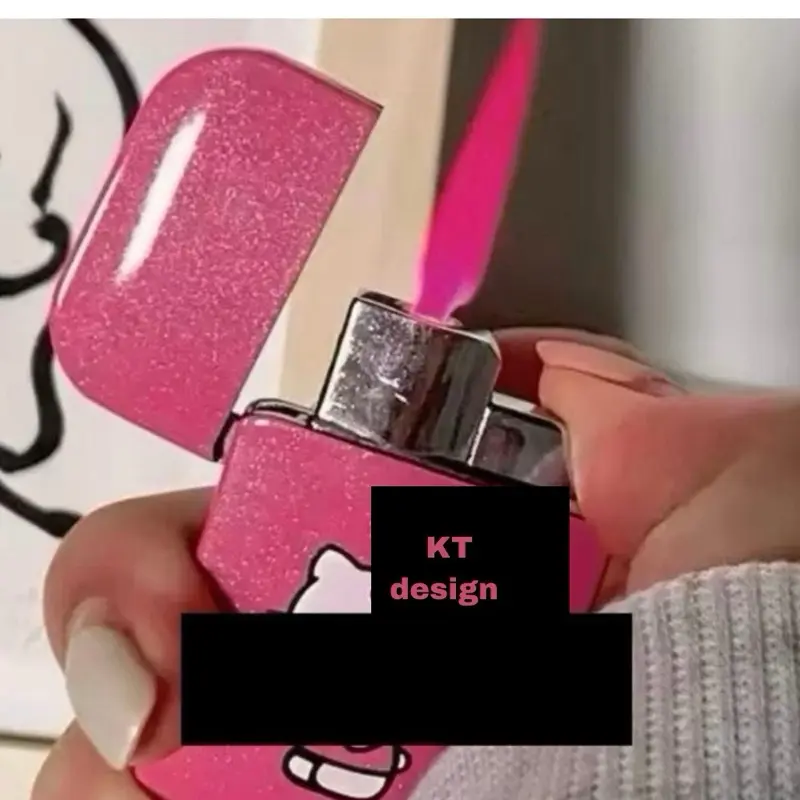 KT Pink Flame Lighter with KT Design Sparkly Pink Finish Butane Not Included Perfect for Fans KT Pink Flame Lighter with KT Design Sparkly Pink Finish Butane Not Included Perfect for Fans