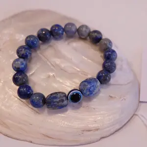 Natural Lapis Lazuli Bracelet with Evil Eye Accent - Handcrafted Beaded Jewelry for Protection and Good Luck