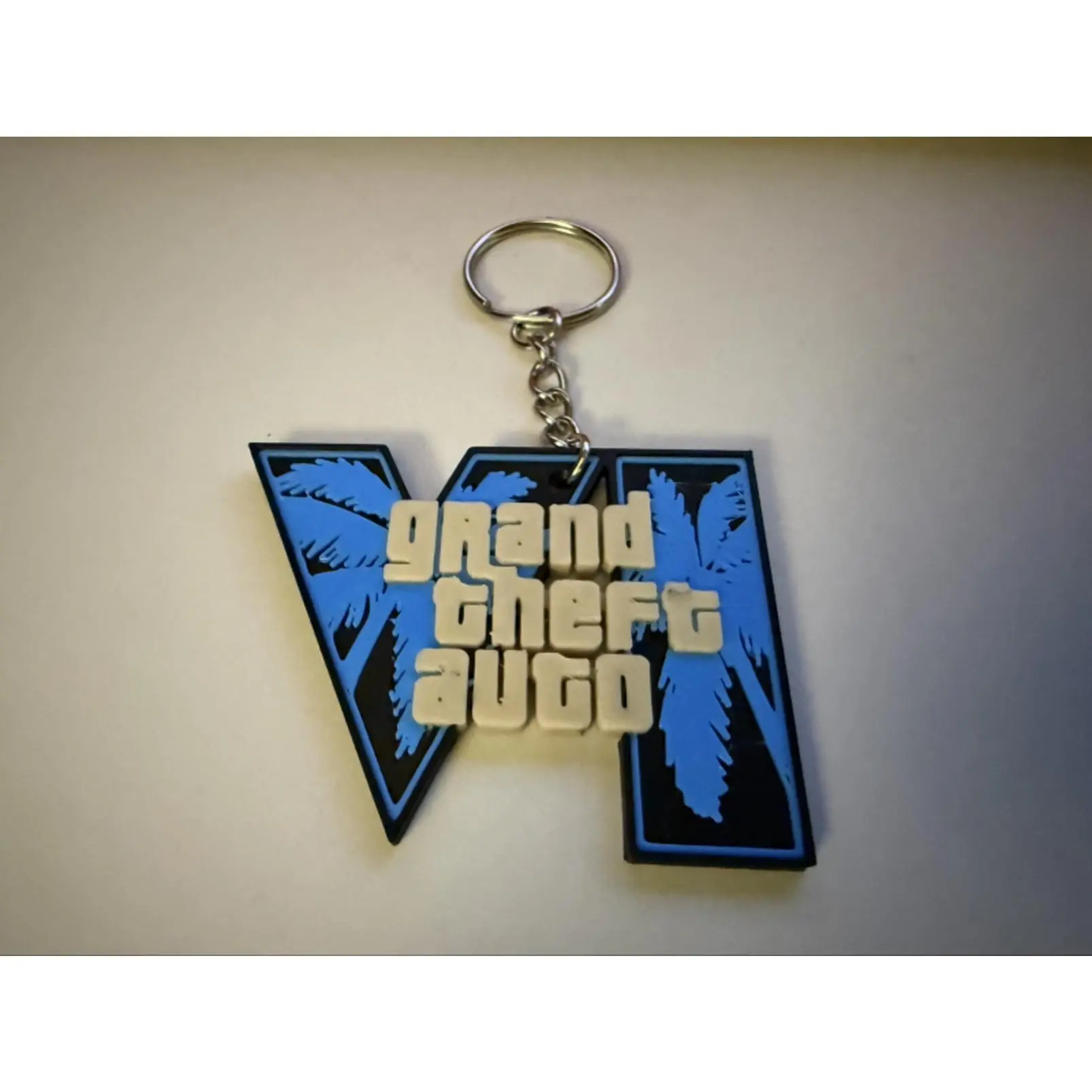 Grand Theft Auto VI Keychain - GTA VI Logo Keychain for Fans and Collectors