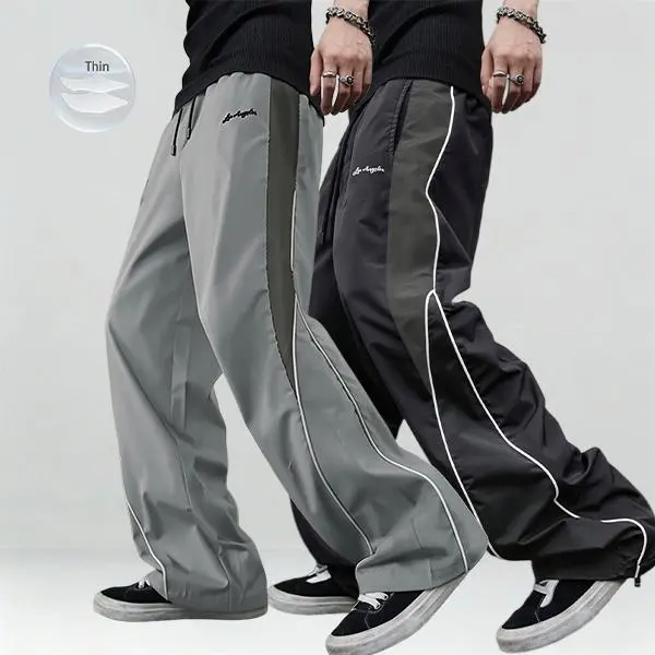 Men’s loose-fit sports pants, 1–2 pieces, gray, with side stripes and white details; comfortable design; sport-casual bottoms—fitness training pants, fitness apparel.