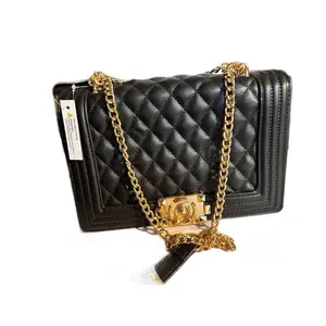 Black Structured Handbag with Gold Chain Strap and Clasp, Quilted Design, Stylish Accessory for Everyday Use