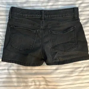 SO Black Denim Shorts Waist: 26 inches. Snap Closure. No Zipper needed. Womenswear Bottom