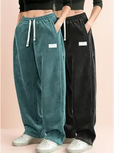 Women’s dark green corduroy two-piece set — high-waisted drawstring loose wide-leg casual pants, suitable for home and light activewear; smooth drape and texture, minimalist women’s piece.