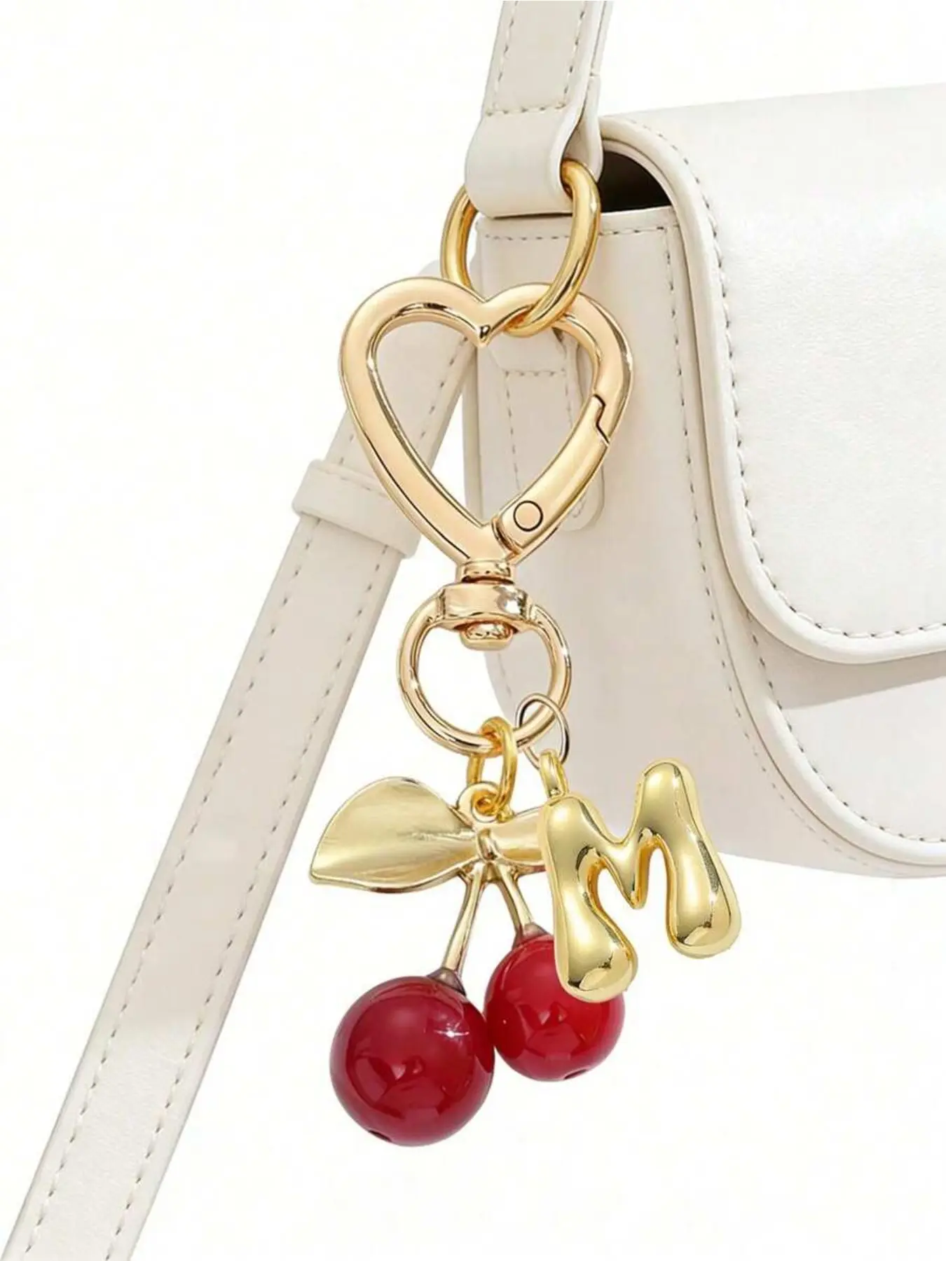 Elegant gold alphabet keychain with pearl bow decor and 3D A-Z letter pendants. Stylish alloy accessory for keys and backpacks. Ideal daily ornament for women, perfect gift for lovers, friends and family on holidays.