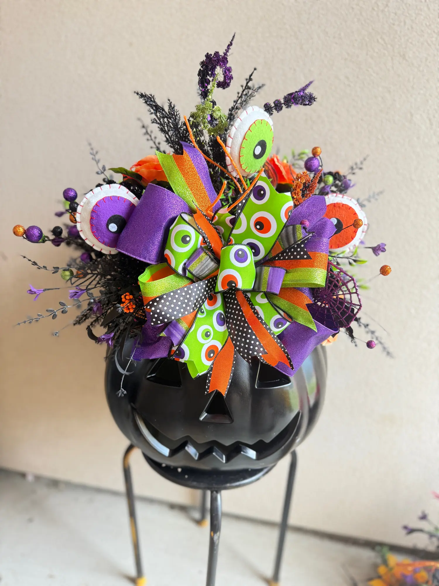 Whimsical Halloween Pumpkin Arrangement | Black Jack-o’-Lantern Centerpiece with Eyeballs, Ribbons & Spooky Décor