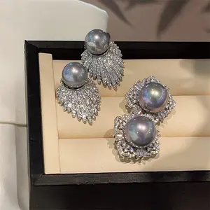 Light luxury style copper micro-inlaid zircon high-gloss shell pearl earrings, sophisticated socialite style dazzling earrings, exquisite ear accessories