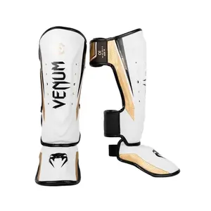 Venum Elite Evo Shin Guards - White/Gold, Comfortable Fit, Lightweight Design, Suitable for Combat Sports Activities