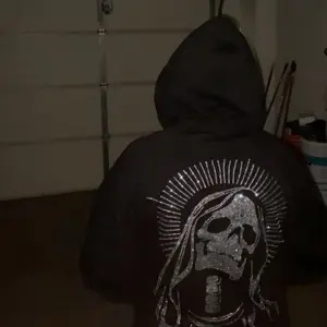 Santa Muerte Rhinestone Zip Up Hoodie with Glitter Skull Design for Edgy Style