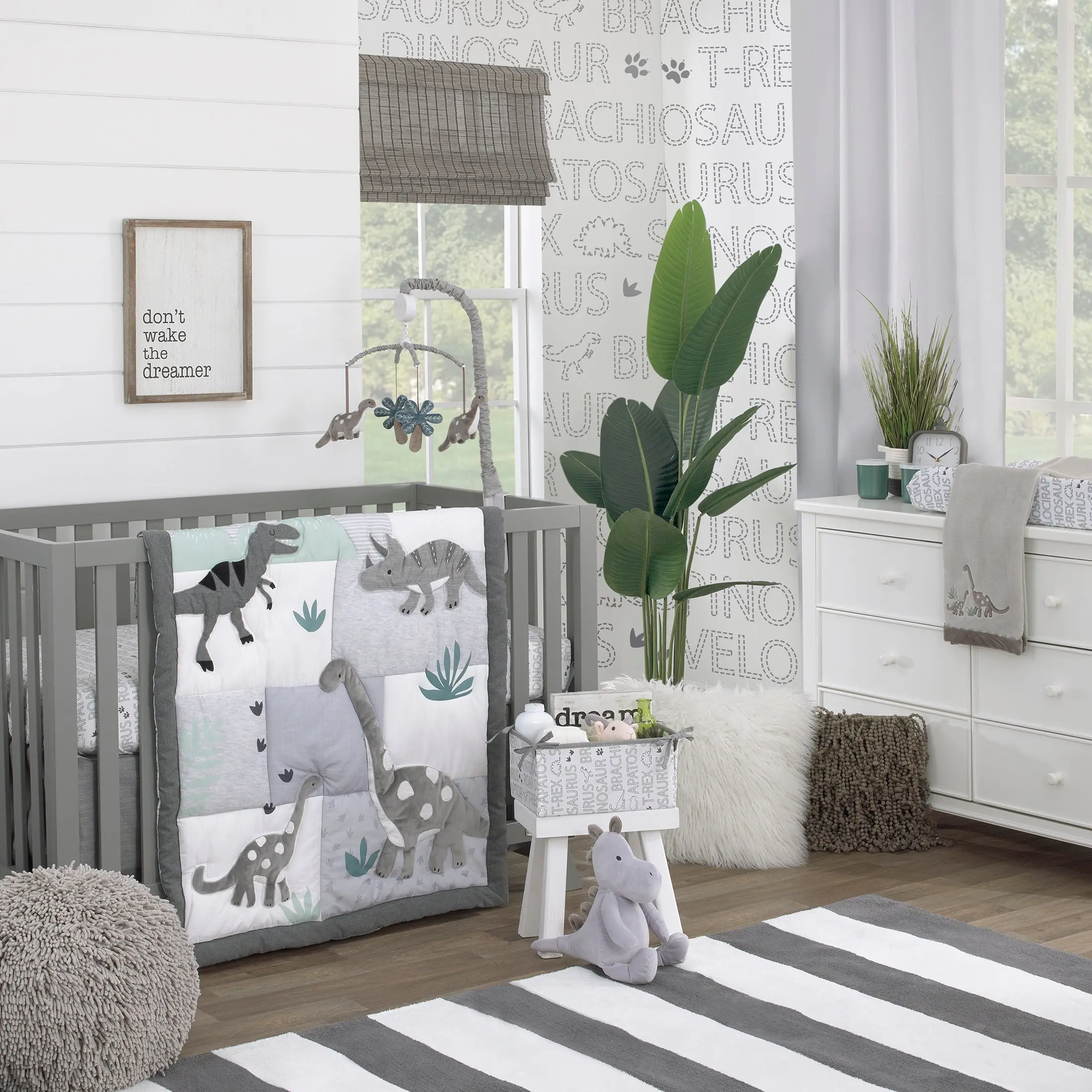Baby-Saurus Gray, White, and Green Triceratops,  Brontosaurus, and Tyrannosaurus Dinosaurs with Mountains and Leaves 4 Piece Nursery Crib Bedding Set - Comforter, 100% Cotton Fitted Crib Sheet, Crib Skirt, and Storage