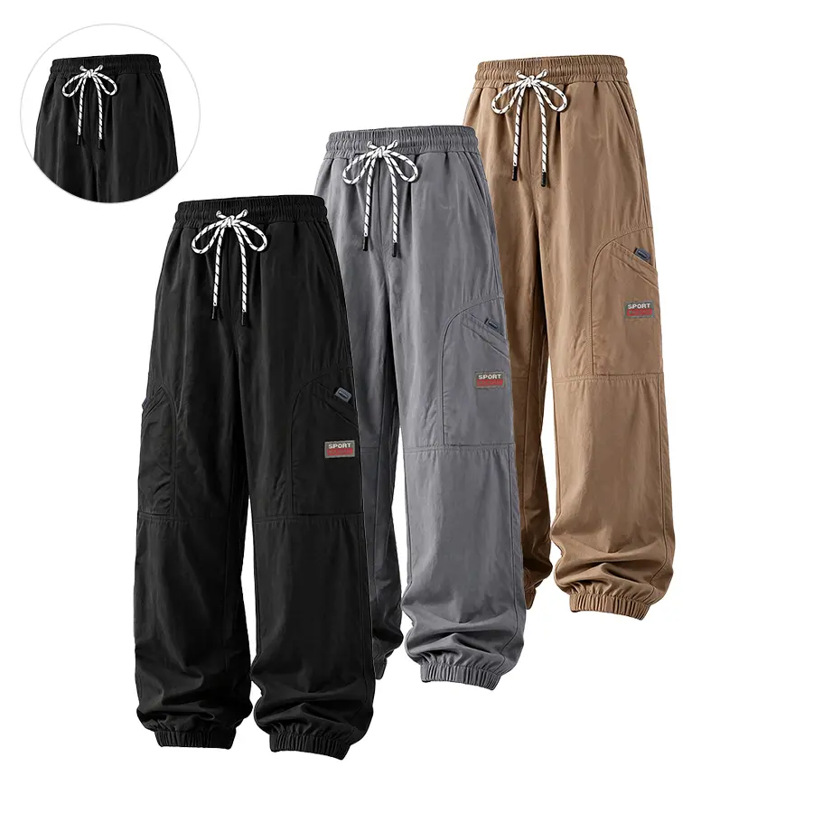 American workwear jogger pants—versatile, goes with any style. Textured jacquard fabric is lightweight and breathable. Elastic waistband with drawstring adjusts to various waist sizes. Large cargo pockets are practical and roomy. Loose cuffed fit that con