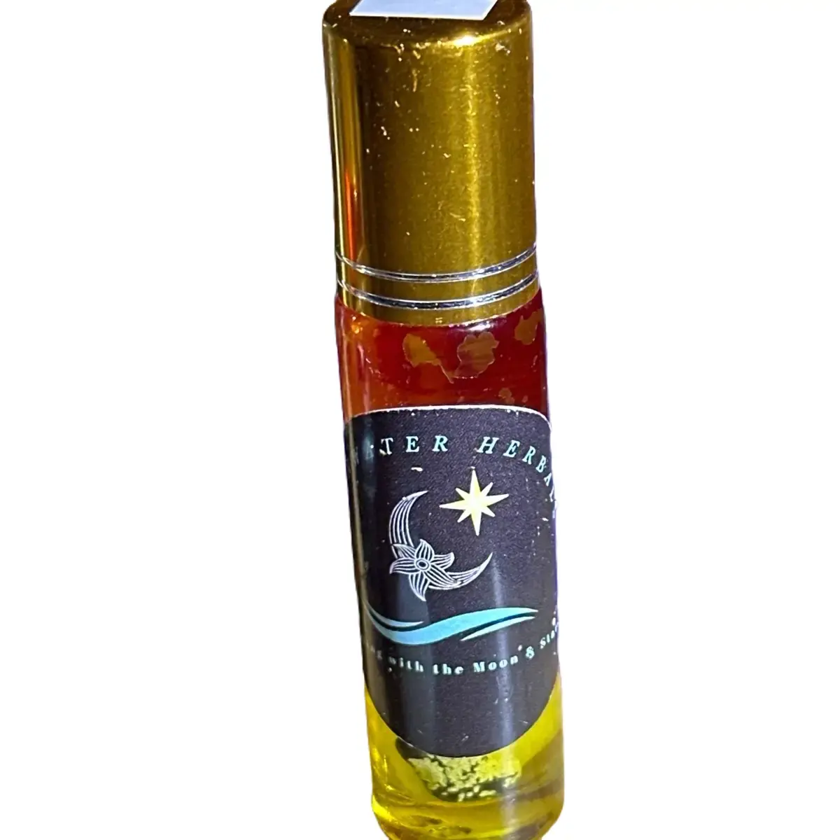 Moonwater Herbals Mosquito Banishing Oil. 10mL glass roll -on Proprietary blend of Citronella essential oil, lavender & Peppermint Oils. Blended in calendula oil for calming skin. Solution Aromatherapy