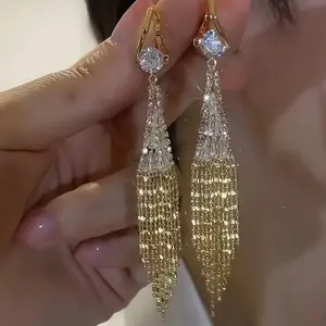 Elegant 14K gold-plated dangle earrings featuring a sparkling tassel design set with shiny cubic zirconia—perfect for matching everyday outfits, party accessories, casual dates, and more.