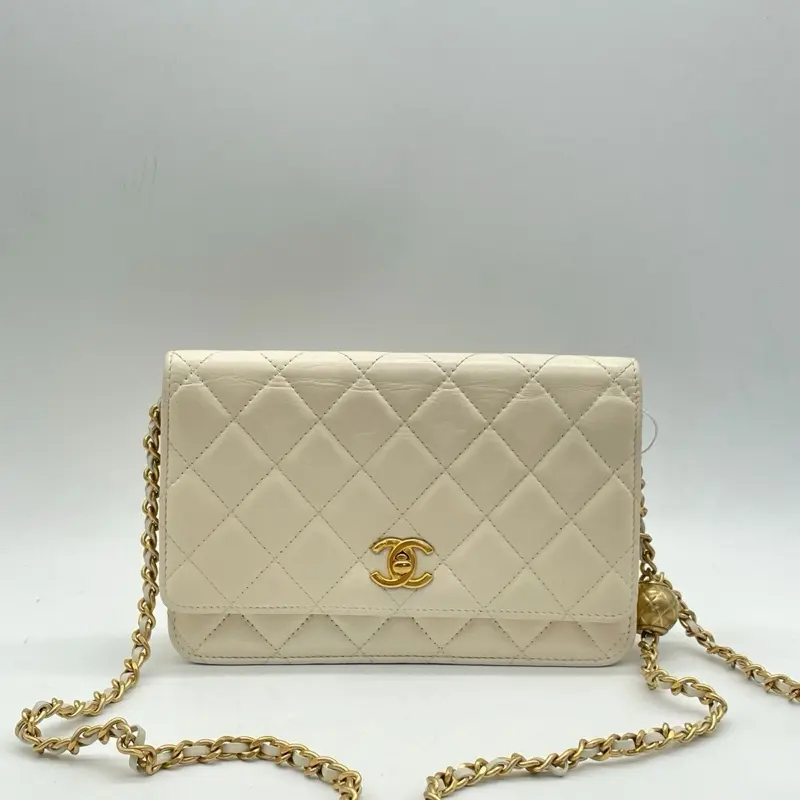 Pre-owned CHANEL leather Shoulder Bags Pre owbed WOC cream white calfskin shoulder bag with gold ball