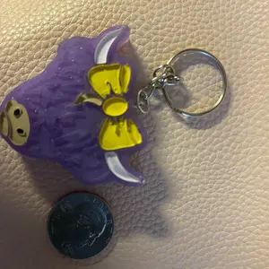 Purple highland cow keychain